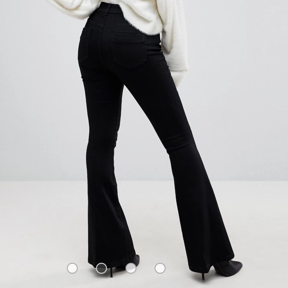 ASOS DESIGN Petite Bell Flare Jeans in Clean Black with Pressed Crease